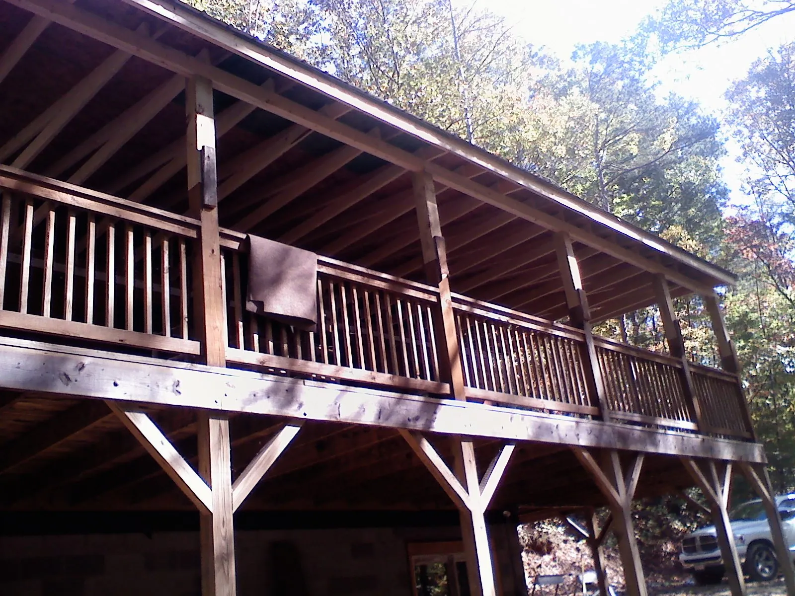 Timber framing under a new elevated porch and deck — Roof Leak Repair in Greenleaf by Roofing Brothers